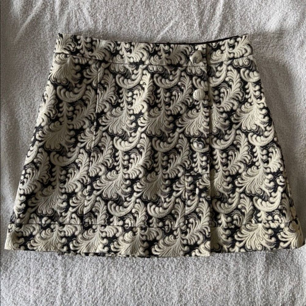 UO Cooperative metallic jacquard wrap mini skirt